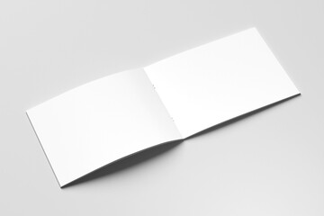 Landscape blank mockup of an open book, magazine, brochure or booklet isolated on a light grey background
