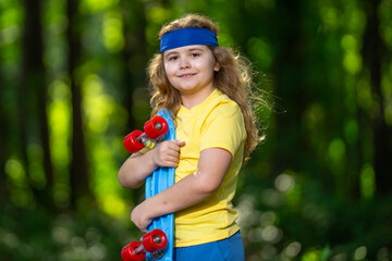 Child doing sport fitness outdoor. Sporty boy exercising sport in summer park. Kid practicing sport...