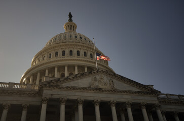 Washington DC. Capitol dome. Congress and Senate Capitol building in Washington D.C.. USA flag over Capitol dome. American Capitol. Congress and Senate in Washington D.C.