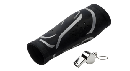 SPORT - Black plastic referee cup with sound holes alongside a metal whistle on white background, perfect for sports officiating and coaching