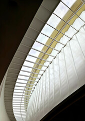 Fototapeta premium Modern architectural perspective with glass and steel