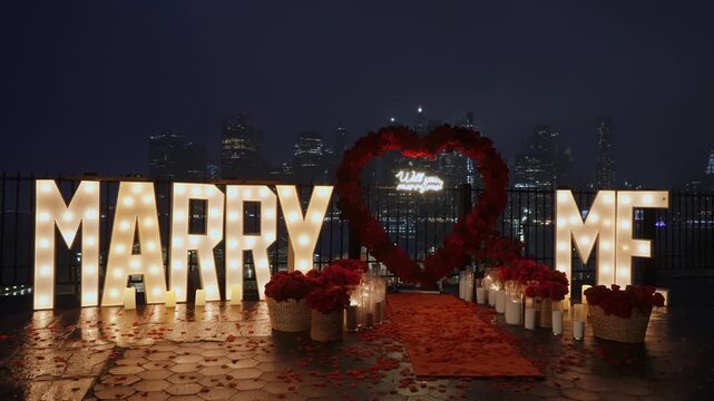 Imagine a stunning and romantic setup for a beautiful marriage proposal adorned with illuminated signs and roses - Powered by Adobe