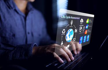 Life cycle assessment LCA concept with a businessman working on computer to analyze products...