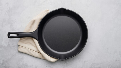 Black cast iron skillet with cloth cooking kitchen