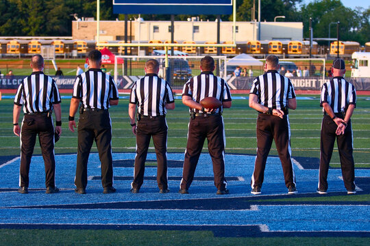 American Football referees lined up before the game