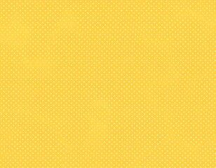 Yellow textured background with white dots