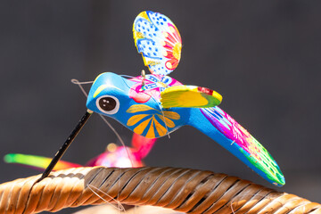 Naklejka premium Aless of a Colibri, Mexican Artesania.