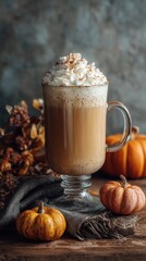 A Cozy Autumn Scene Featuring a Delicious Pumpkin Spice Latte Topped with Whipped Cream Surrounded by Decorative Pumpkins and Autumn Leaves