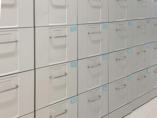 Metal filing cabinets in archive storage — hospital records, patient files, office documents,...