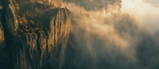 A Mountain Cliff Face Disappears into Clouds