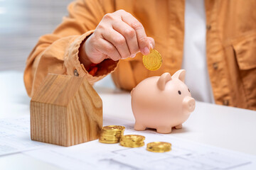 Saving money for mortgage loan and real estate investment with house and bank finance