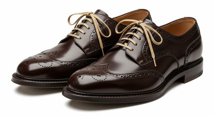 Fototapeta premium Elegant Brown Leather Brogue Shoes Perfect for Formal Attire and Sophisticated Style on a White Background Studio Shot