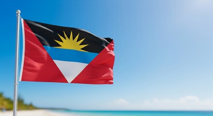 Naklejka premium Antigua and Barbuda Flag Waving on a Tropical Beach, copy space