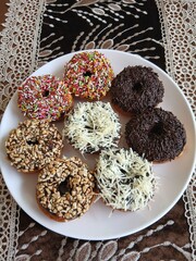 Delicious donuts with various toppings on top, a delicious snack choice that is easy to make