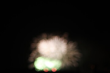 Fireworks in a night sky with bokeh effect
