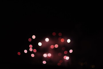 Fireworks in a night sky with bokeh effect
