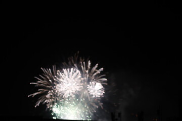 Fireworks in a night sky with bokeh effect
