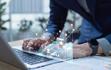 Businessman reviewing online digital marketing data on modern interface, analyzing sales growth,...