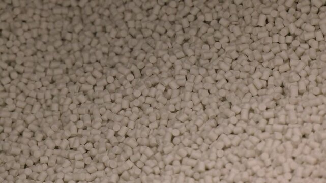 Plastic Resin ( Masterbatch). Grey Chemical Granules for Industrial Plastic Production. white plastic resin, Dyed synthetic polymer resins. pellets material factory