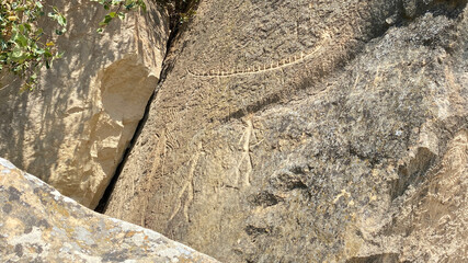 Rock carvings made during the Mesolithic period. The Gobustan National Historical and Artistic Reserve is an archaeological site in Azerbaijan