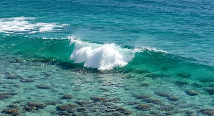 Fototapeta premium Ocean wave breaking on the surface.