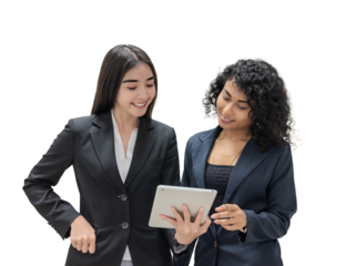 Two Businesswomen Collaborate on Digital Tablet in Office