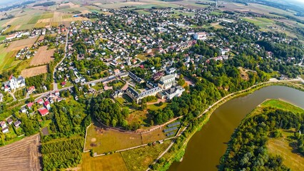 High altitude, wide angle, aerial view of Drohiczyn, a picturesque town in Eastern Poland at the Bug River. 