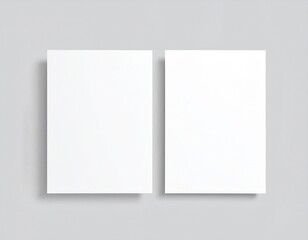 Fototapeta premium Blank folded paper mockup on gray background, top view of empty white sheet template for flyer, brochure, invitation, or leaflet design presentation, minimal clean stationery concept with soft shadows