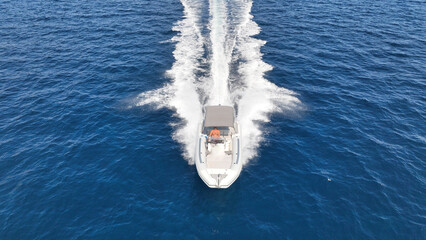 Aerial drone top down photo of  luxury inflatable rib speed boat cruising in mediterranean sea