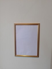 Empty frame displaying potential art piece minimalist room photography indoor eye-level creativity unleashed