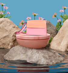 Elegant, two-tone pink shoulder bag featuring a soft leather finish and adjustable strap for...