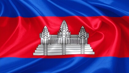 Close-up of Cambodia national flag with Angkor Wat temple emblem on red and blue fabric waving.