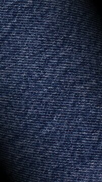 Elegant display of blue denim textile rotation with subtle tactile relief, creating refined luxurious background in a premium exclusive design format
