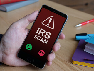 IRS Scam call is shown as business and financial concept. Internal Revenue Service