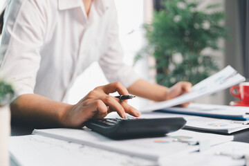 Business woman analyze calculate company financial, tax results office accounting statistics...