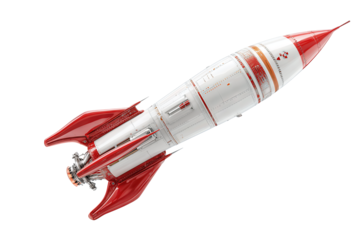 Retro-style white rocket with red fins and fiery exhaust angled upward, isolated on transparent background.
