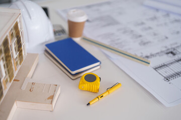 Architect professional design building blueprints construction project planning urban development engineering model modern studio workspace creativity