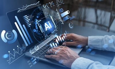 Futuristic AI data analysis concept with holographic interface graphs and charts over laptop screen while person types on keyboard in modern workspace.