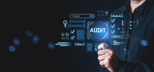 Business audit analysis interface with data icons and magnifying glass concept..