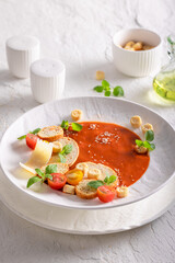 Refined tomato soup as elegant and tasteful fine dish.