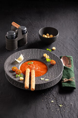 Exclusive tomato soup as top chef-crafted dishes.