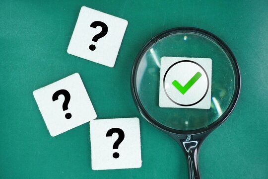 Magnifying glass with right or true and question mark symbol. symbolizing investigation, validation, inquiry, or seeking truth. research, decision-making, fact-checking, and analysis