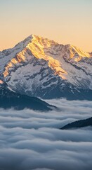 Obraz premium Snow-covered mountain summit glowing in the warm light of dawn