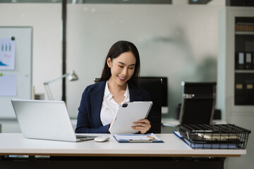 Business woman consultants discuss tax, merger strategy and restructuring in modern office.