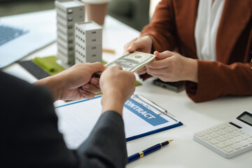 Broker signs a sales agreement. agent, lease agreement, successful deal.