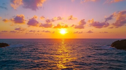 Obraz premium Serene Ocean Sunset with Vibrant Pink and Orange Hues