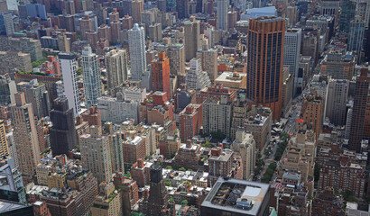 Obraz premium high angle view of the highly urbanized area of Midtown Manhattan in New York with skyscrapers and streets and cars