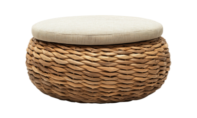 Round woven wicker ottoman with cushioned beige top, featuring a braided natural fiber base and soft upholstered seat.