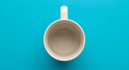 Empty White Ceramic Coffee Cup on Bright Blue Textured Background Top Down View