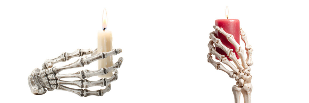 Set of a different Halloween skeleton hands holding candles, isolated on a transparent background.